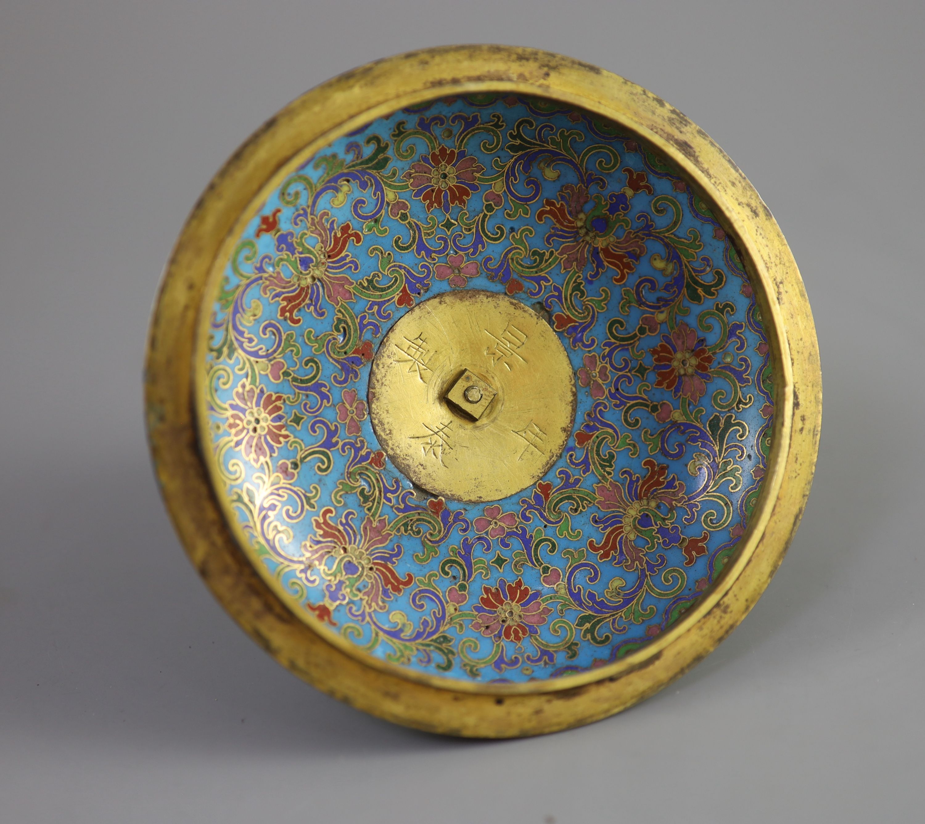 A Chinese cloisonné enamel and gilt bronze cover, late Ming/early Qing, 17th century, 11.5 cm high, 13.5 cm diameter. Provenance - Old Scandinavian collection.